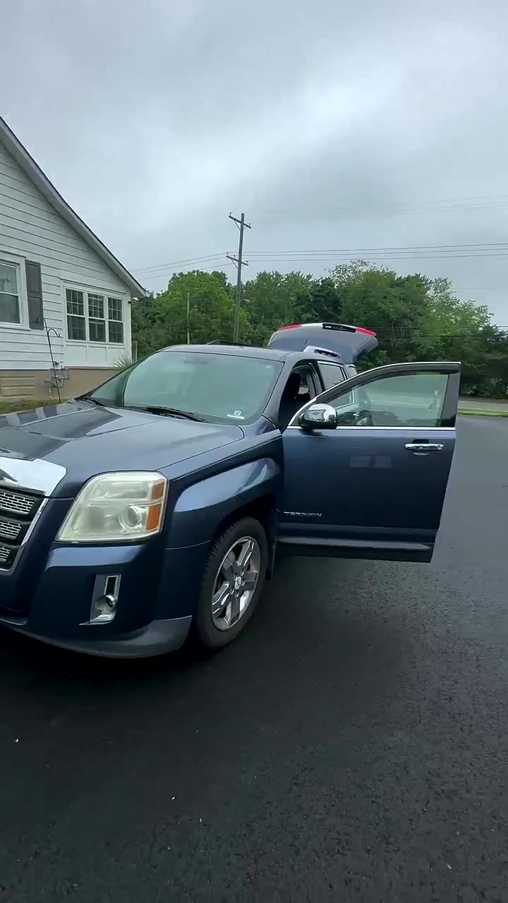 Blue GMC Terrain detailed inside and out